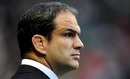 England coach Martin Johnson watches his side warm up