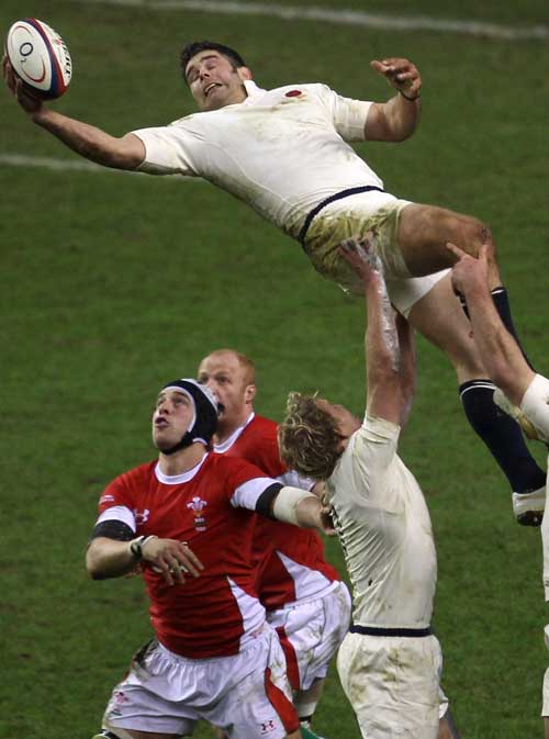 Nick Easter reaches for a line out against Wales