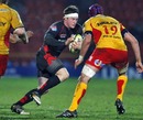 Saracens' Andy Saull takes on the Dragons' defence