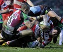 Gloucester's Tom Voyce forces his way over for a try