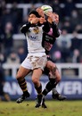 Wasps' David Lemi and Newcastle's Danny Williams compete for a high ball