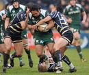 London Irish centre Seilala Mapusua is shackled by the Worcester defence