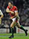 Wales fly-half Stephen Jones moves the ball