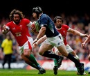 Scotland's Alasdair Dickinson takes on the Welsh defence