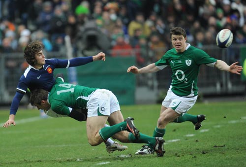 France wing Alexis Palisson is tackled by Ireland's Tommy Bowe
