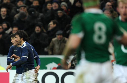 Clement Poitrenaud is congratulated by Francois Trinh-Duc after scoring France's third try