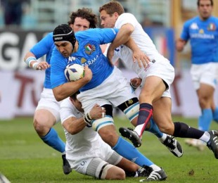 Italy's Quintin Geldenhuys is felled by the England defence, Italy v England, Six Nations Championship, Stadio Flaminio, Rome, Italy, Februry 14, 2010