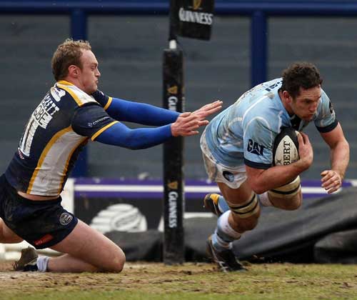 Leicester flanker Craig Newby slides in to score