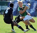 South Africa's Kyle Brown is shackled by the New Zealand defence