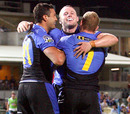 Cameron Shepherd, Richard Brown and David Pocock celebrate a try for Force