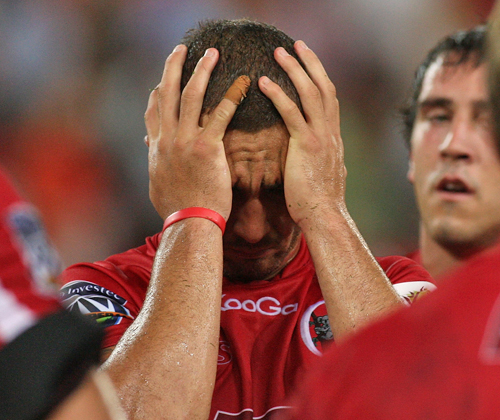 The Reds' Quade Cooper reacts to a loss