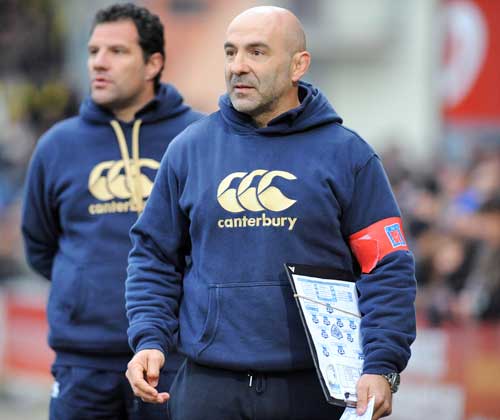 Castres' coaches Laurent Travers (R) and Laurent Labit (L) watch their side in action