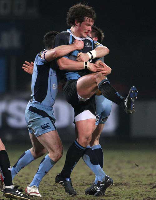 Glasgow's Peter Horne is shackled by the Cardiff Blues defence