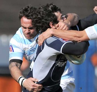 Castres' Marc Andreu is tackled by the Racing Metro defence, Racing Metro v Castres, Top 14, Stade Yves-du-Manoir, Colombes, France, February 20, 2010
