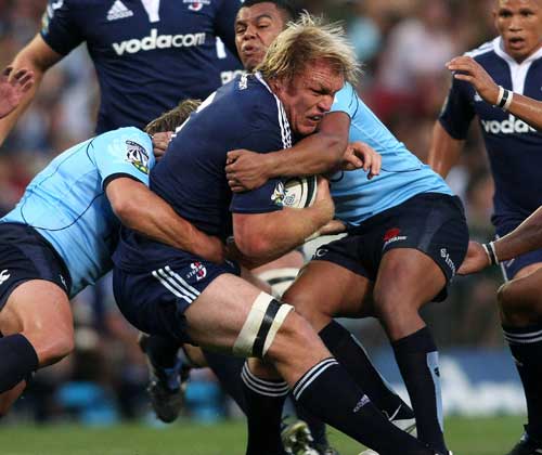 The Stormers' Schalk Burger is shackled by the Waratahs' defence