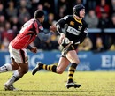 Wasps fly-half Danny Cipriani stretches the Saracens defence