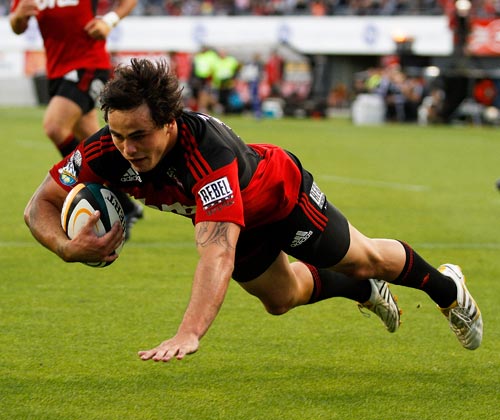 Crusaders wing Zac Guildford touches down against the Sharks