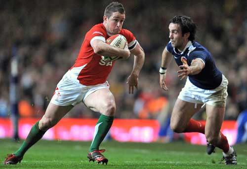 Wales' Shane Williams evades the France defence