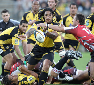 All eyes are on the ball as Ma'a Nonu offloads in traffic, Hurricanes v Lions, Super 14, Westpac Stadium, Wellington, New Zealand, February 27, 2010.