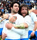 Italy's Luke McLean and Martin Castrogiovanni celebrate victory over Scotland
