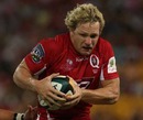 Reds fullback Peter Hynes takes on the Waratahs defence
