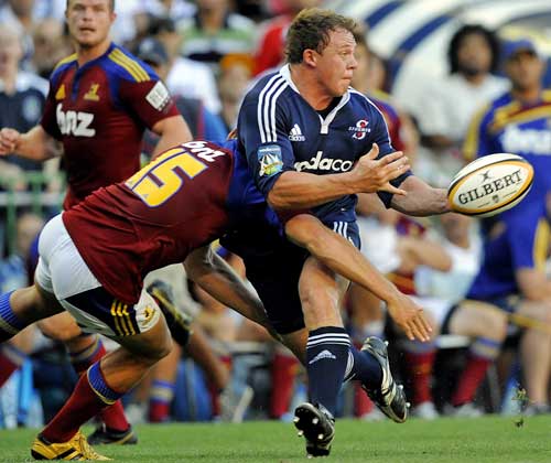 The Stormers' Deon Fourie off loads in the tackle