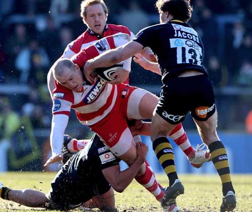Gloucester's Mike Tindall is felled by the Wasps defence