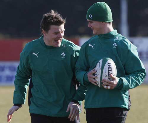 Ireland skipper Brian O'Driscoll shares a joke with fly-half Jonathan Sexton during training